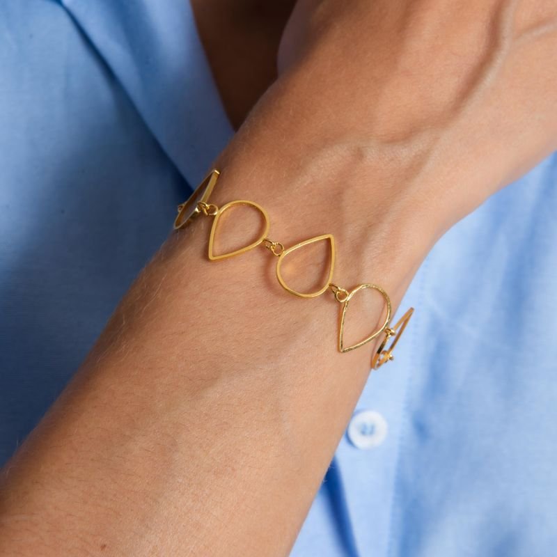 PULSEIRA TESSÁLIA GOTA VAZADA BANHADO A OURO 18K