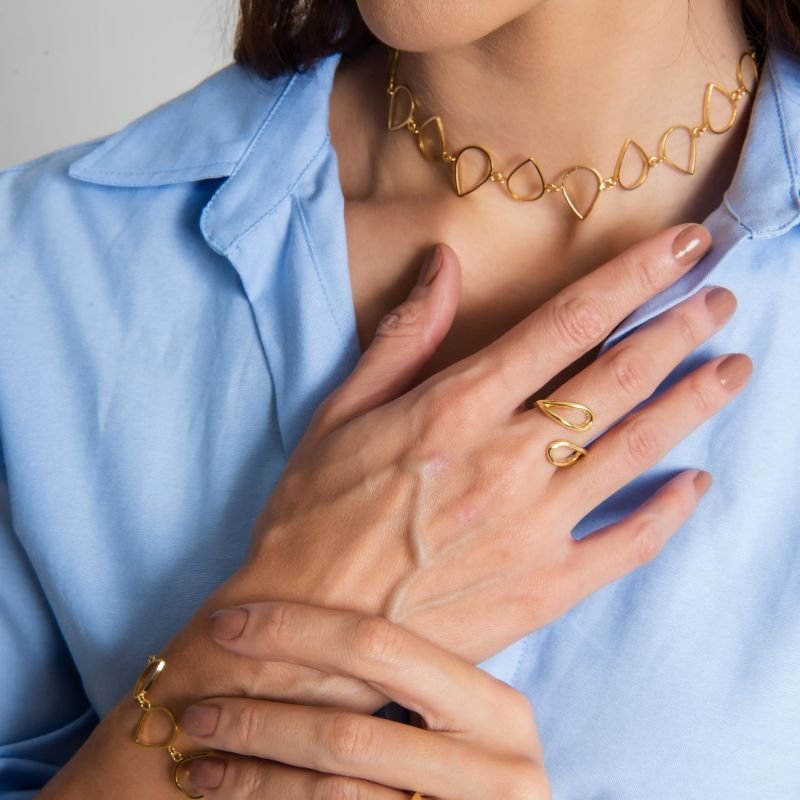 PULSEIRA TESSÁLIA GOTA VAZADA BANHADO A OURO 18K