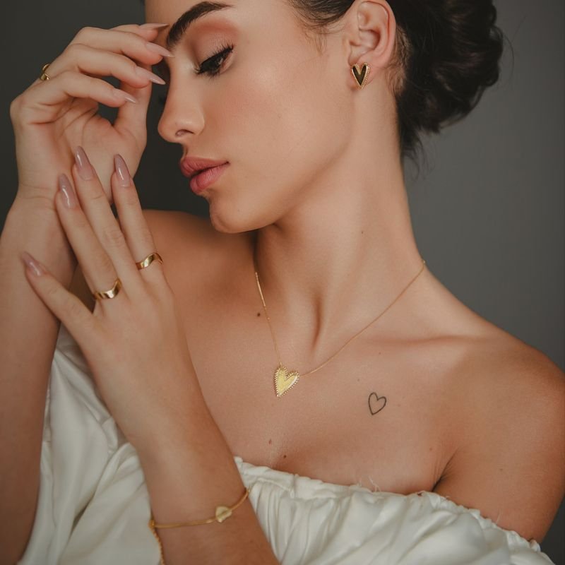 PULSEIRA TRÊS CORAÇÕES RABO DE RATO DOURADO FOLHEADO