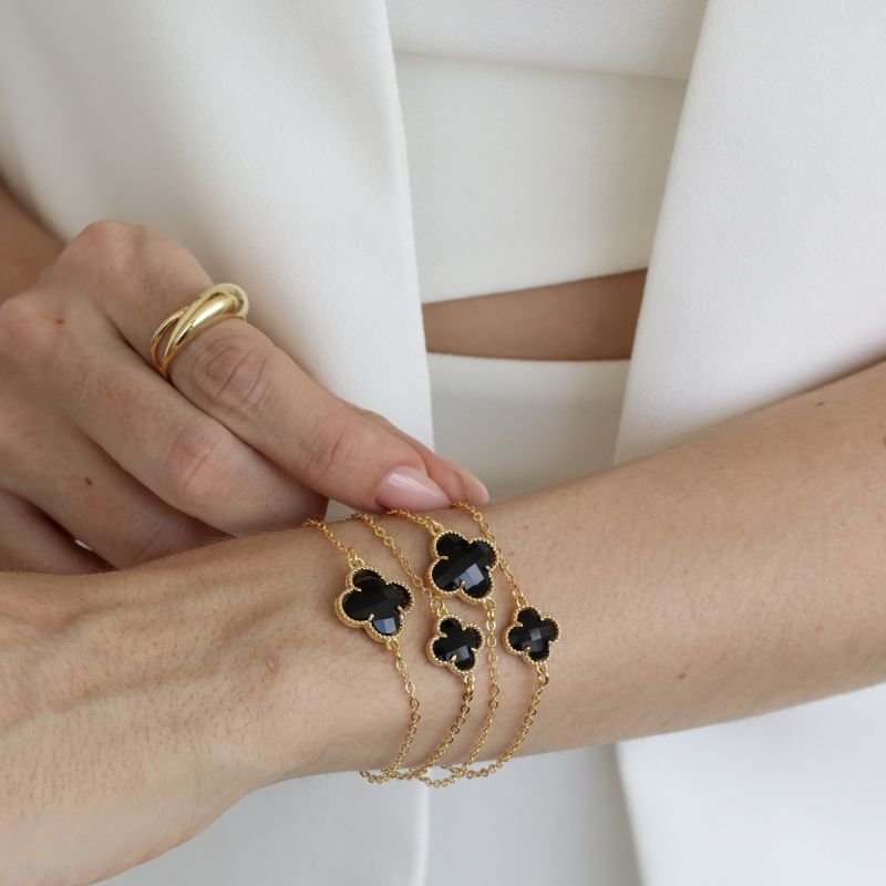 PULSEIRA TREVO PRETO DOURADO