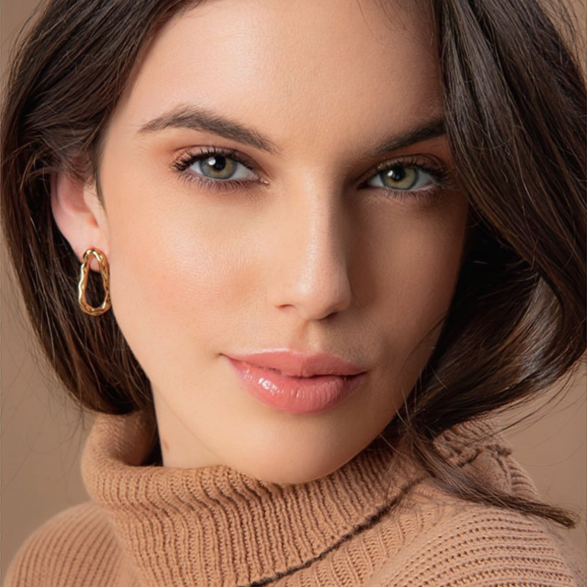 BRINCO ONDAS DOURADO FOLHEADO