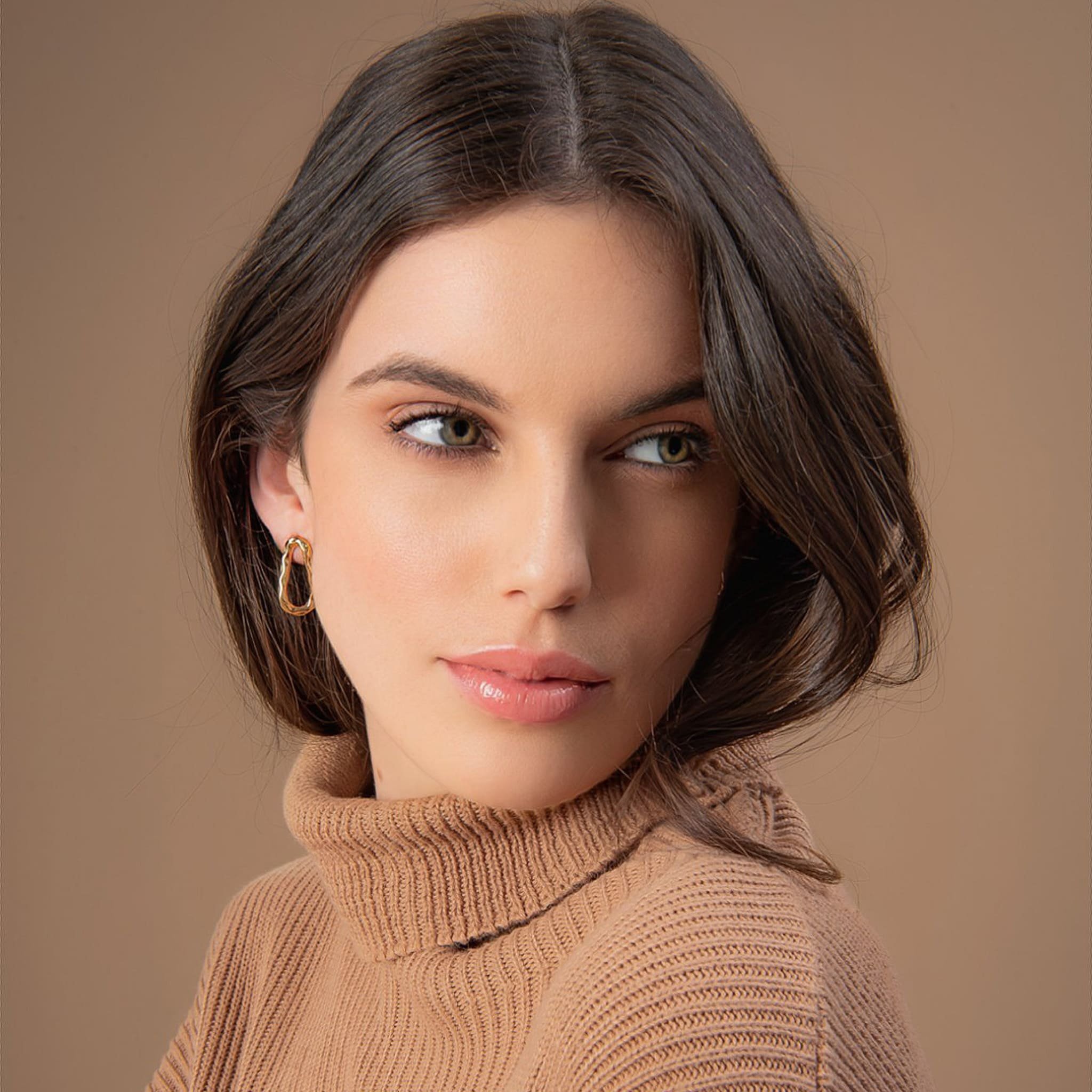 BRINCO ONDAS DOURADO FOLHEADO