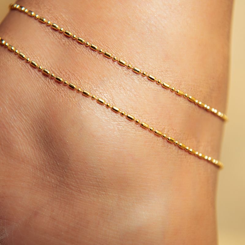 TORNOZELEIRA CILIDRICA DOURADO FOLHEADO